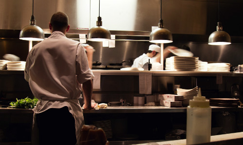 people working in a professional kitchen