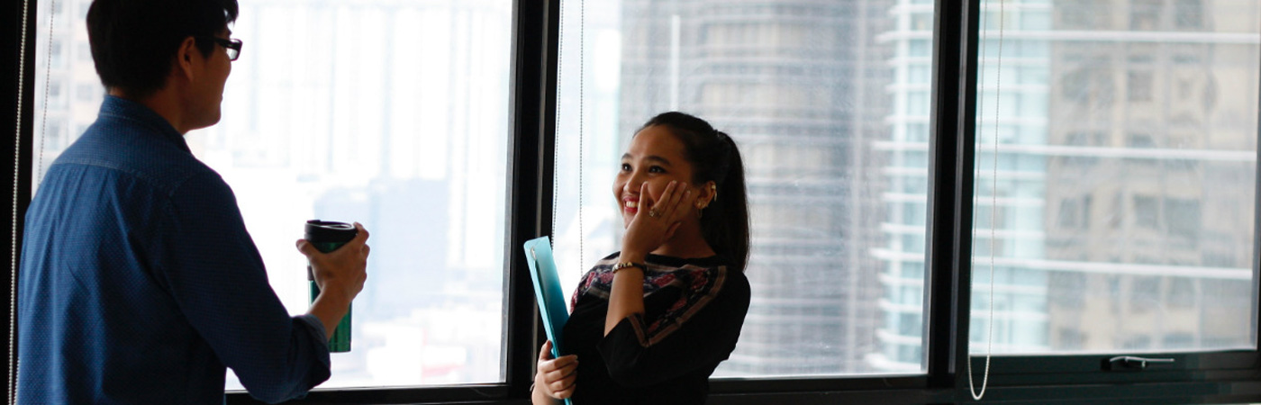 businesswoman in discussion with colleague