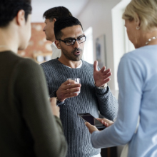 man gesturing in discussion